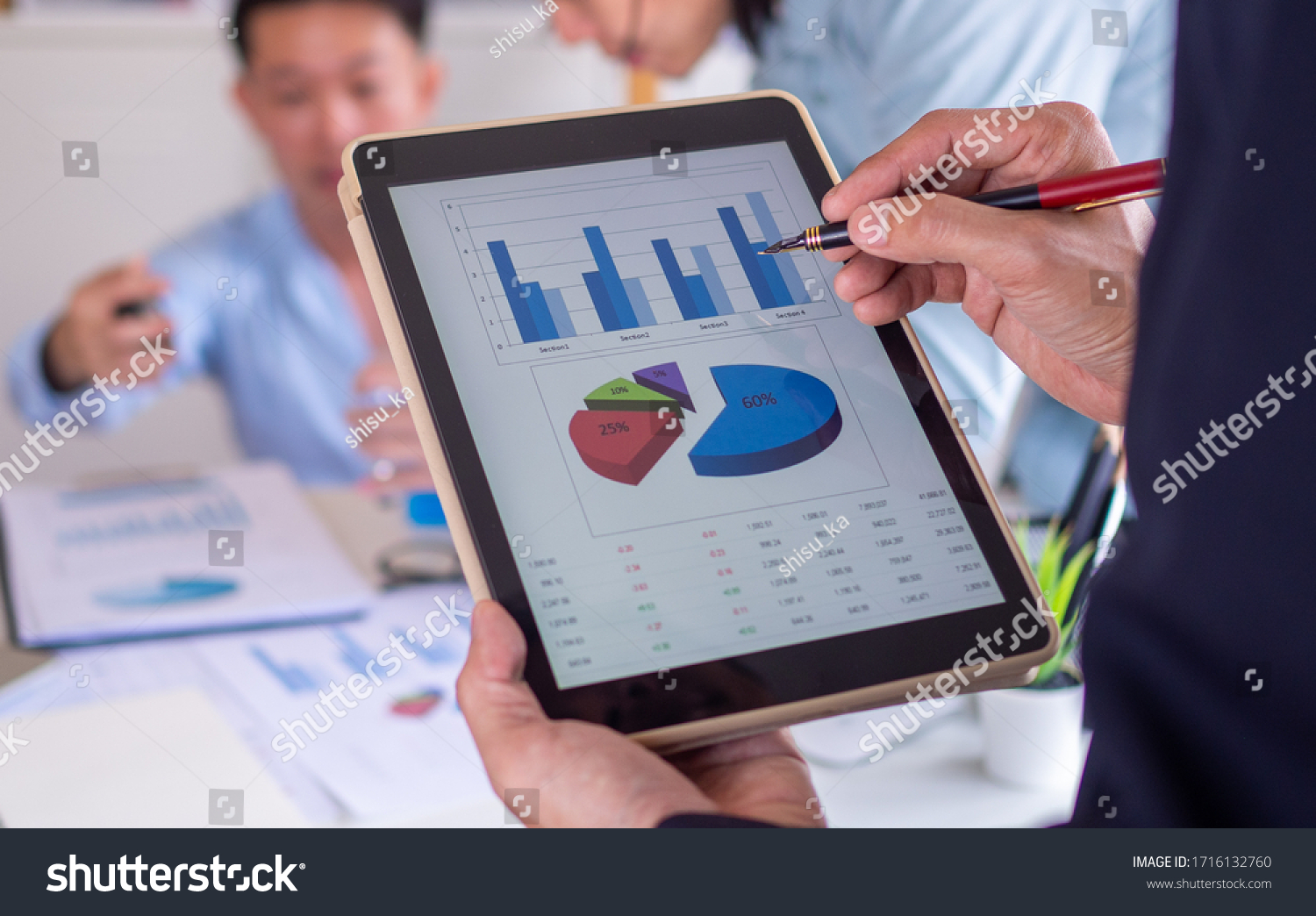 https://www.techneplus.com/wp-content/uploads/2023/01/stock-photo-businessman-pointing-to-the-data-on-the-tablet-the-business-team-of-the-organization-is-1716132760.jpg